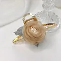 Elegant gold metal hair claw clip featuring a handmade cream rose flower ornament - Beige Lace Flower