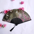 Bamboo folding fan with green fabric, pink floral patterns, and black silk tassel - Green Pink Flower Butterfly Style (Women's Fan-78)