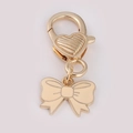 Golden lobster clasp with a beige bow charm for DIY jewelry and keychains - Gold Bowknot