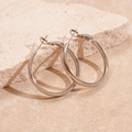 Minimalist silver geometric hoop earrings with polished finish on stone display - Silver 3cm (Silver Pin)