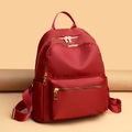 Waterproof oxford fabric backpack in deep red finish with golden metal zippers - Large / Red
