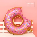 Pink donut shaped foil balloon with sprinkles for kids birthday party 72x48cm - Large Bitten Donut