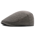 Dettaglio del tessuto tweed a spina di pesce grigio su una coppola retrò da uomo - M (56-58cm) / Cuoio