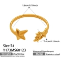 Detail of gold star-shaped stainless steel open ring showing dimensions and weight - Size 7