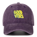 Close-up of GOOD VIBES embroidery on washed purple cotton denim baseball cap - Purple