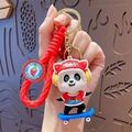 Cute panda keychain with red tiger hat, blue skateboard, and red woven lanyard - Skateboarding Panda