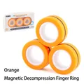 Tre anelli magnetici arancione brillante antistress con confezione regalo colorata - 36.2g / 168-31 Arancione