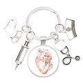 Silver medical keychain with floral heart heart, stethoscope and syringe pendants - Heart Anatomy