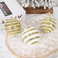 Close-up of three gold glitter Christmas balls with stripes on a snowy wooden tray - Gold 8cm Candy Color Foam Ball / Set of 3