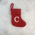 Red knit Christmas stocking with white letter C embroidery and hanging loop for decor - Letter C