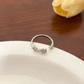 Silberner Ring mit herzförmigem lila Edelstein und Zirkonia-Schleifen-Akzenten - Rosa Herz Zirkon Silber (J909)