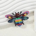 Colorful insect-shaped enamel brooch with striped patterns and vibrant artistic finish - Colorful Insect