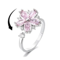 Primer plano de anillo giratorio de plata S925 con pétalos rosas y diseño ajustable - Anillo Giratorio de Pétalo Rosa