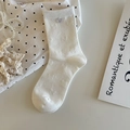 Calze bianche in cotone con trama a coste e un elegante motivo a farfalla intrecciato - Taglia unica / Bianco Puro