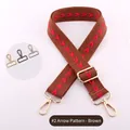 Adjustable brown bag strap with red arrows and light gold metal hardware clips - Brown