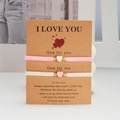 Bracciali intrecciati rosa e bianchi per coppie con ciondoli a cuore su carta - Rosa e Bianco - Set di 2