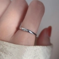Minimalist silver twist open ring with a small heart design on a finger - Delicate Heart Open Ring (J2160)