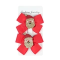Detail of two red grosgrain ribbon Christmas bows with glitter Santa Claus figurines - Santa Claus / Red