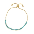 Adjustable gold bracelet with turquoise beads and sparkling round charms on white background - Turquoise