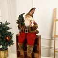 European Santa Claus figurine in red and brown holding gifts sitting on wooden shelf - Red-Brown Sitting Style 57cm