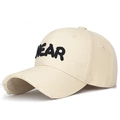 Beige cotton baseball cap with black NEAR 3D embroidery and distressed ripped brim detail - Adjustable / Light Beige