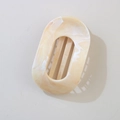 Beige marble-patterned resin hair claw clip with elegant hollow oval flower design - Bulk Packaging / Oval Clip / Beige