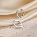 Detail view of silver hexagonal hoop earrings with white crystals showing size and weight - Silver Hexagon