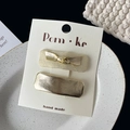 Set of two gold bow hair clips and plain rectangular clips on beige card display - Square Fabric Bow Clip