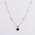 Golden necklace featuring a black circular pendant and geometric cuboid spacer beads - Gold Round
