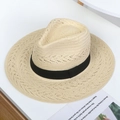 Close-up of beige woven straw hat featuring detailed cross-weave and black grosgrain ribbon - Wheat Straw Panama Hat - Black Buckle Ribbon