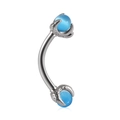 Macro detail of dragon claw curve barbell jewelry with blue orb in polished steel - Aquamarine