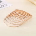 7-piece set of minimalist 3.6mm rose gold polished stainless steel stackable bangles - Inner Diameter 68mm / 7-Pack Set / Rose Gold