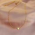 Minimalist gold heart pendant necklace for women on elegant purple silk fabric background - Three Hearts Necklace (X960) / Gold