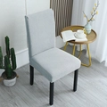 Light blue-grey stretch chair cover with waffle grid texture in a cozy home setting - General Specification / Silver Gray