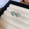 French camellia stud earrings with light blue enamel petals and golden trim details - Light Blue-Gold-Camellia