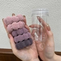 Set aus 4 elastischen Haargummis in Pink und Lila mit Aufbewahrungsbehälter - 1 Dose Lila Serie Handtuch Haargummis (5 Stück/Packung)