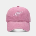 Close-up of pink washed cotton baseball cap with white abstract drumming embroidery - Adjustable / Pink