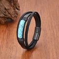 Detail of multi-layer black braided leather bracelet with turquoise stone on wood - Turquoise Stone Decor
