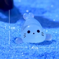 Miniature blue glowing seal figurine for DIY micro landscapes, 1.7cm wide resin ornament - Prone Seal
