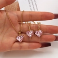 Golden jewelry set featuring heart-shaped pink zircon necklace and matching earrings - Pink Heart Rhinestone Style