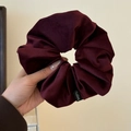 Oversized burgundy corduroy scrunchie with ribbed texture and woven brand label detail - Purple Red Velvet Scrunchie