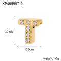 Detailed macro view of a gold-plated T-letter pendant with micro-pave cubic zirconia - Perforated Zirconia Letter T