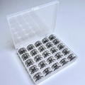 25 Black Bobbins In A 25-compartment Box / Shuttle Core Storage Box