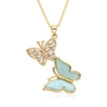 Detailed macro view of dual butterfly pendant necklace with blue stone and zircon stones - Blue Agate-Look Butterfly Style (F248)