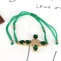 Adjustable green braided rope bracelet with luxury gold cross and green crystals - Green