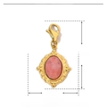 Macro view showing dimensions of vintage stainless steel sun pendant with pink stone - Oval-Pink Stone