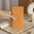 Portable amber orange leather glasses pouch with automatic closure and pebble texture - 17cm x 8.5cm / Amber Orange