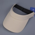 Detail of beige visor hat with UVLABCL logo and UPF 50+ sun protection hangtag - M (56-58cm) / Beige