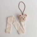 Detail of cute plush bear head attachment and beige herringbone textured hanging strap - Milk Tea 3D Bear