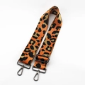Close-up of adjustable leopard print bag strap with gunmetal swivel hooks and metal buckle - Orange With Gunmetal Buckle